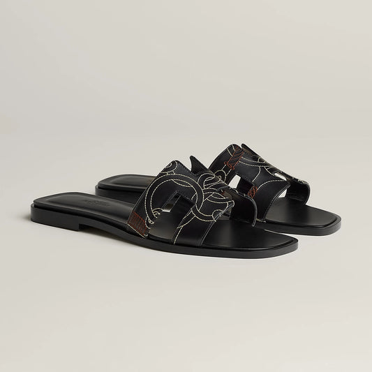 Claquettes Oran - Black Monogram